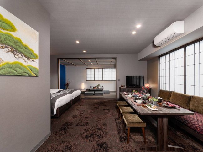 Japanese-modern guest room interior at MIMARU Tokyo Ginza EAST. A 2025 Travelers' Choice award-winning Apartment Hotel in the Ginza area of Tokyo. Spacious rooms ideal for family trips as a base for shopping and sightseeing