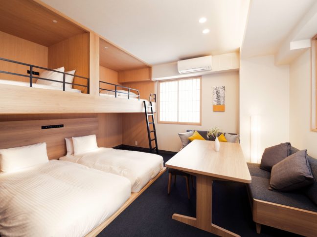 MIMARU Tokyo Hatchobori's Japanese-style room and bunk bed connecting family apartment. Located near Hatchobori Station on the JR Keiyo Line and Tokyo Metro Hibiya Line, convenient for Tokyo Disney Resort® and Asakusa sightseeing, accommodating up to 8 people with kitchens in every room.