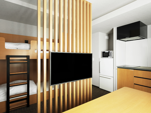 MIMARU東京 STATION EASTの1ベッドルーム客室のダイニングリビング。東京駅徒歩圏のアパートメントホテルで最大6名が同室宿泊可能。新幹線・全国移動の拠点に最適なファミリー向け長期滞在ホテルの広々とした室内